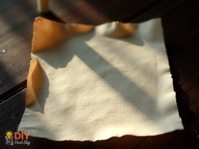 Folding paper edges toward the center while making a big paper box.