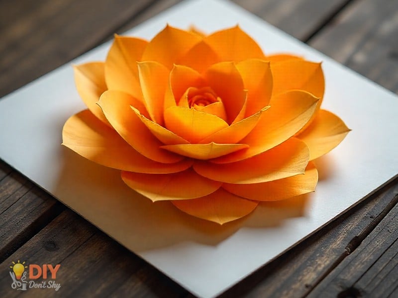 Stacked paper petals glued together for a handmade flower birthday card.