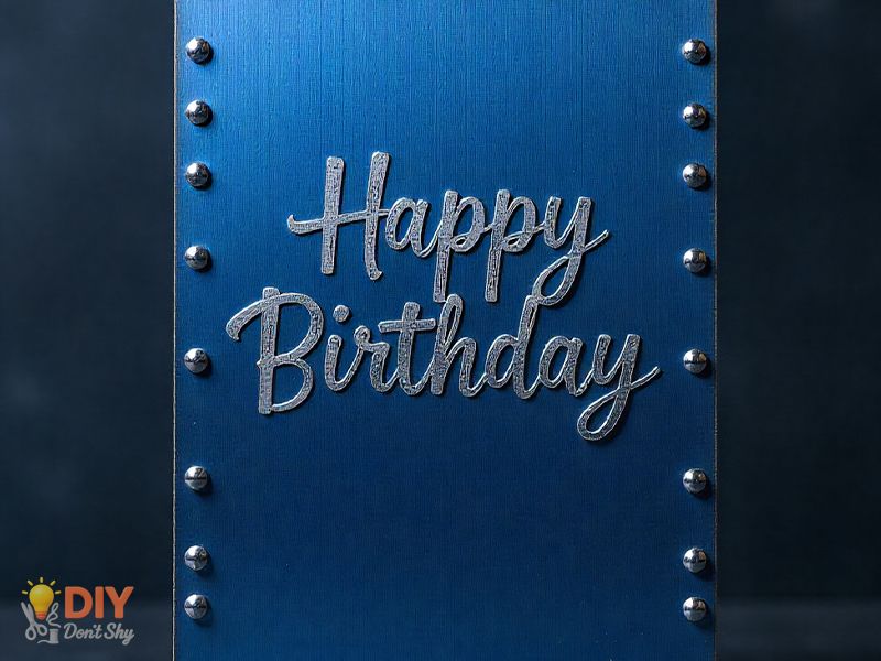 Elegant handmade birthday card with navy background and silver lettering.