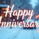 Happy 50th wedding anniversary with golden decorations and cake at home.