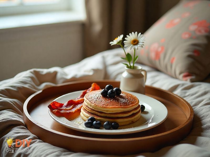 Homemade breakfast tray with food and flowers as a thoughtful anniversary gift for parents.