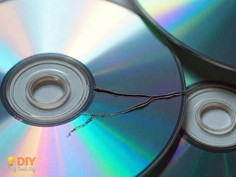 Common Mistakes To Avoid When Working With CDs shown through damaged materials