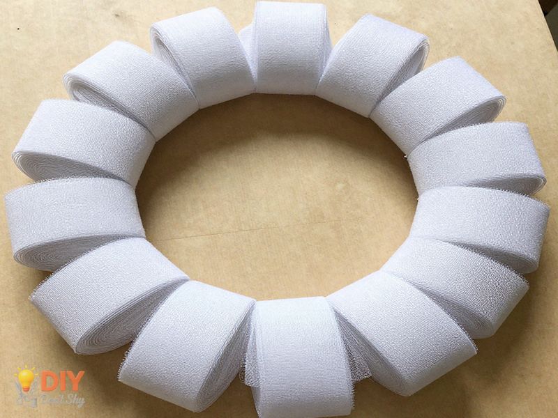 Creating The Base of a Valentine wreath using deco mesh