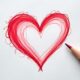 Realistic top-view drawing of a Valentine heart with pencil guidelines on white paper.