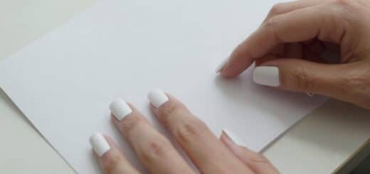 Paper nails without glue made from folded printer paper in a clean realistic setup