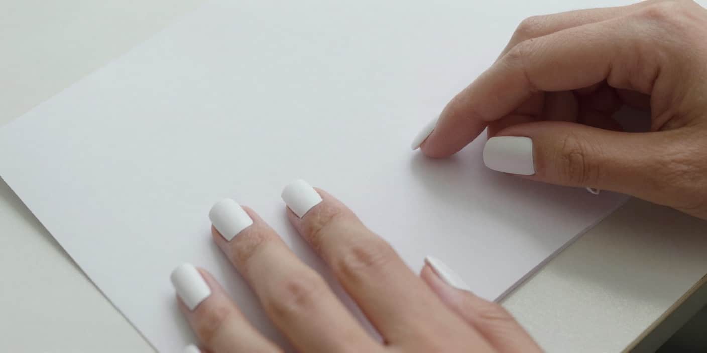 Paper nails without glue made from folded printer paper in a clean realistic setup