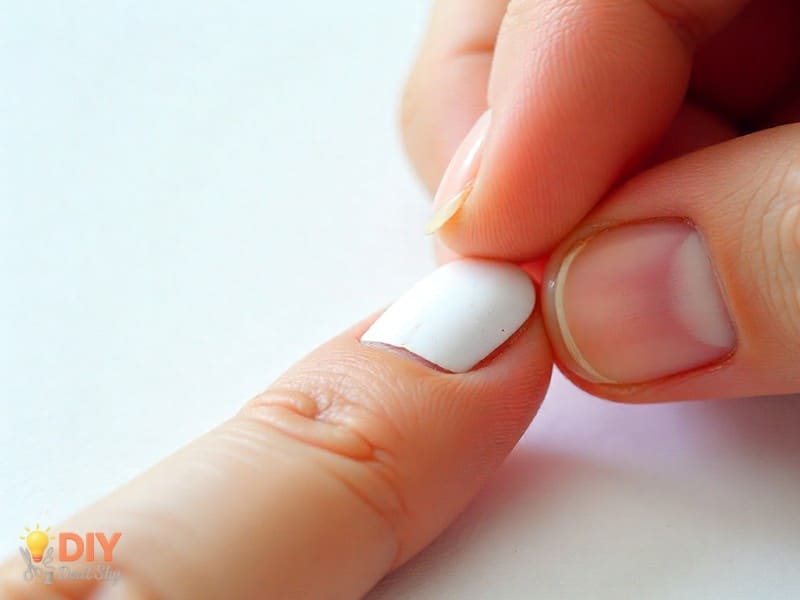 Step Six Fitting And Adjusting paper nails on the finger