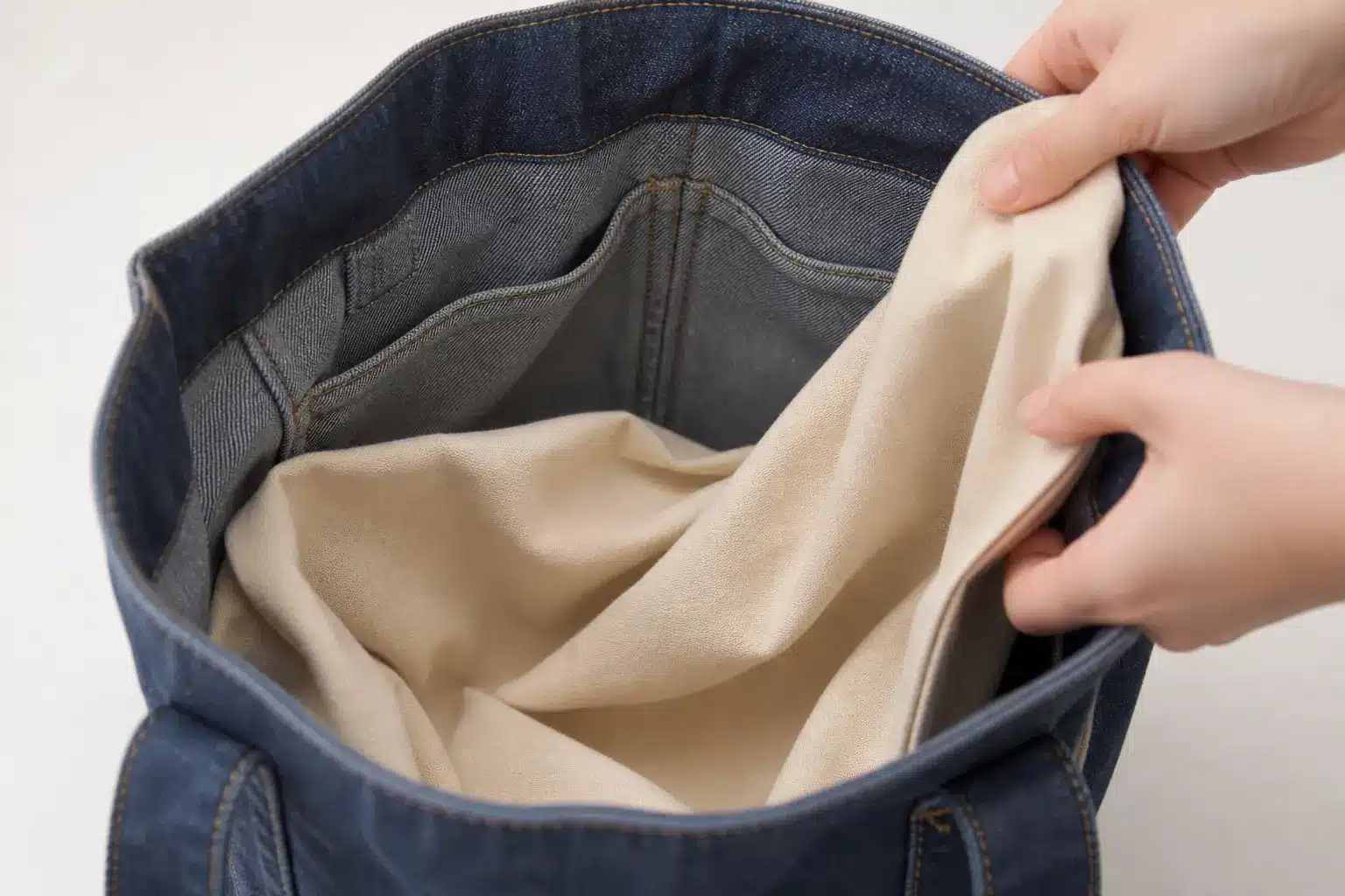 Inserting inner lining fabric into a denim bag for a clean finish