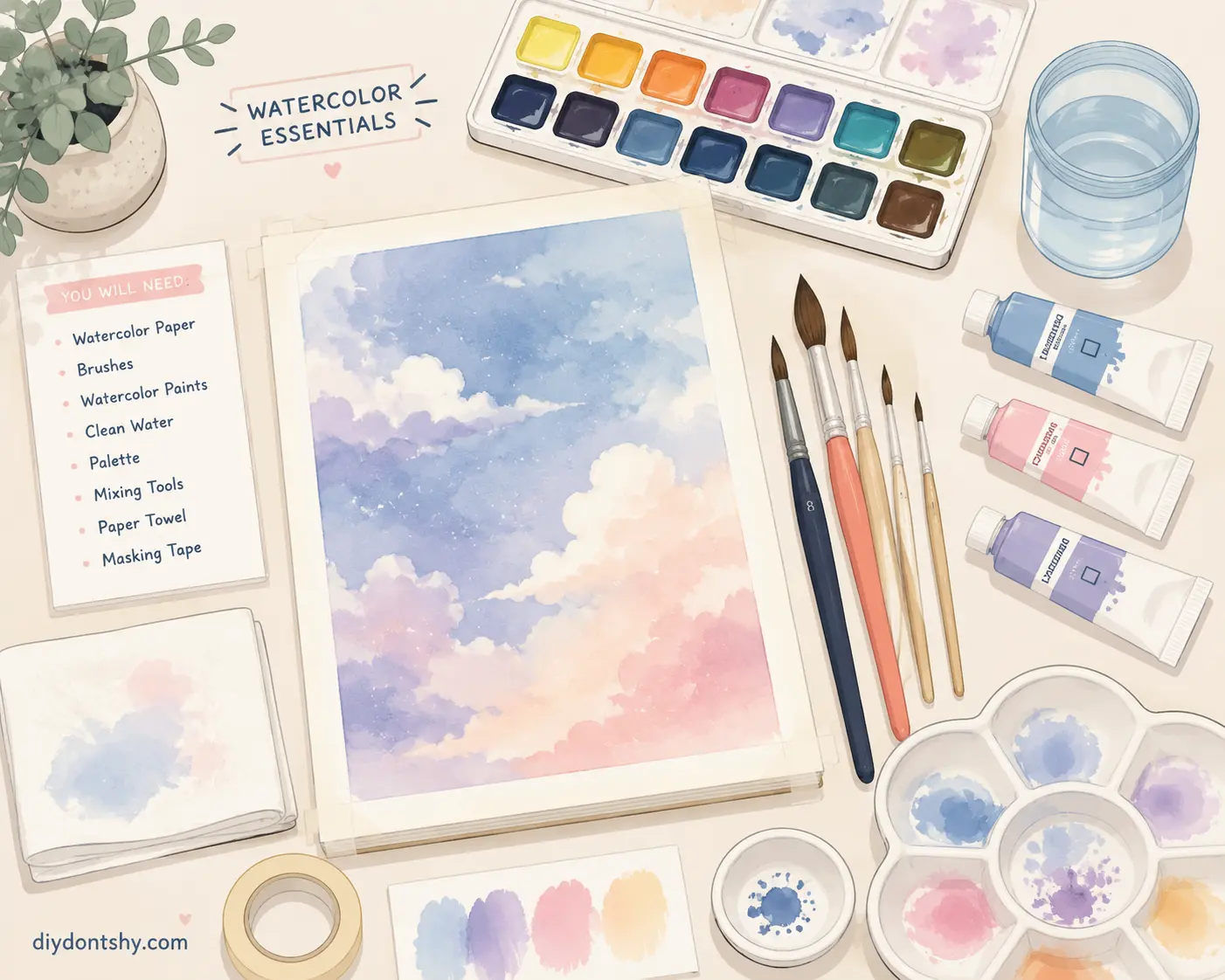 Watercolor supplies arranged for painting sky techniques